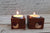 Mahogany candle holders with inlaid wood